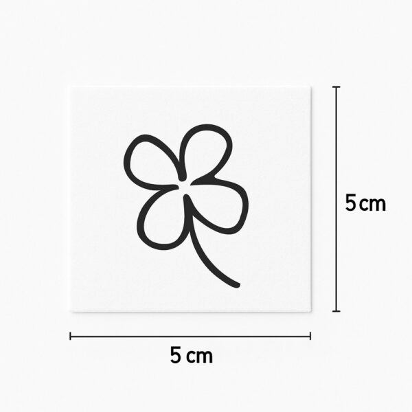 Tatouage trèfle à quatre feuilles